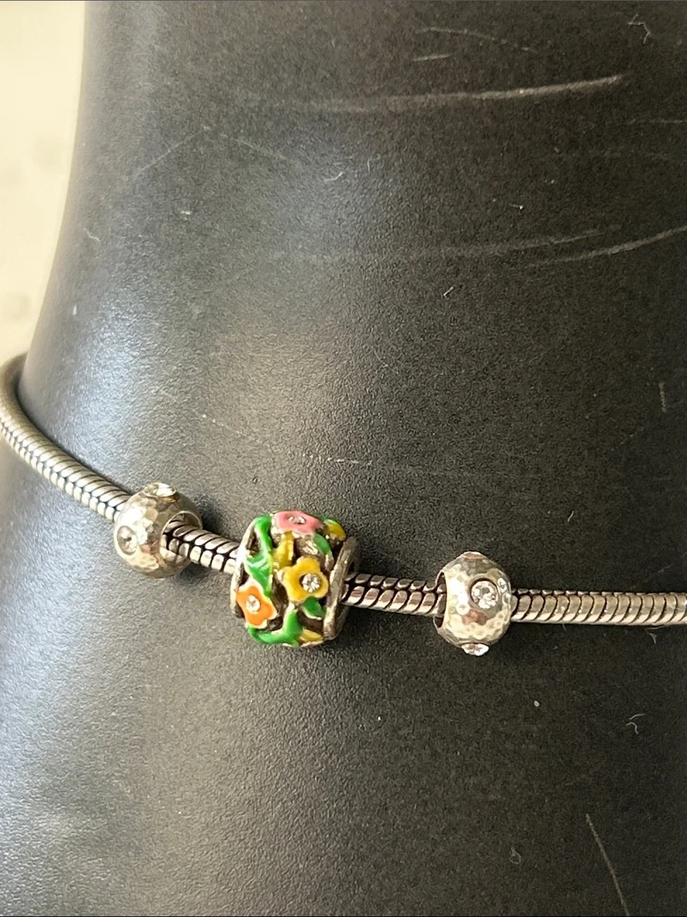 Brighton snake charm bracelet with “Flower Child” enamel colorful bead charm